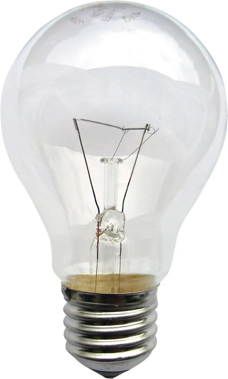 A clear filament lamp showing the thin coiled wire inside