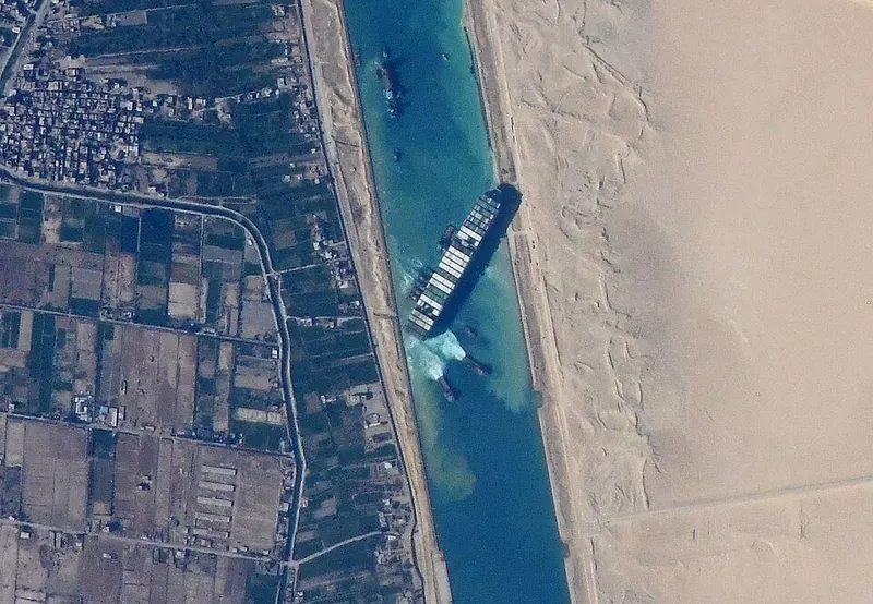 A huge container ship in the Suez Canal seen from space