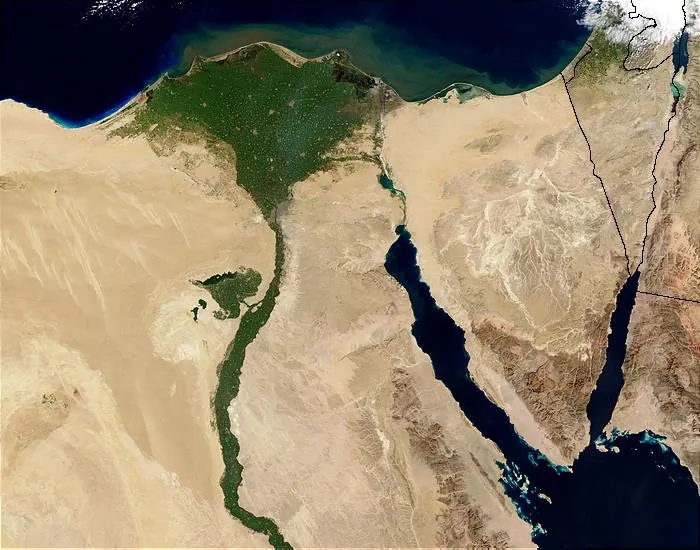 Satellite view of Egypt with a green strip along the Nile and a green Delta in sandy desert