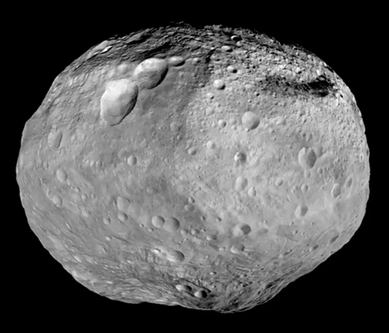 The cratered, lumpy surface of the asteroid Vesta