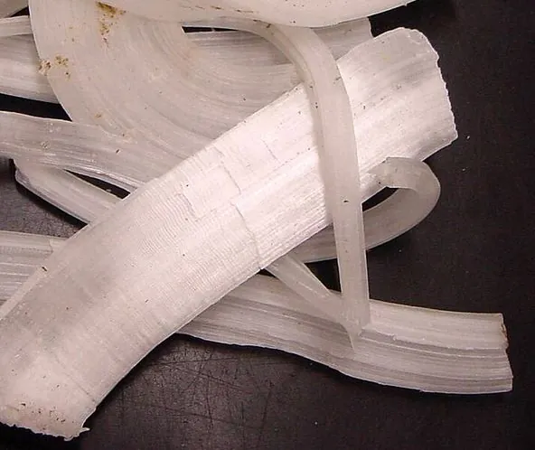 White fibrous crystals of halite (rock salt)